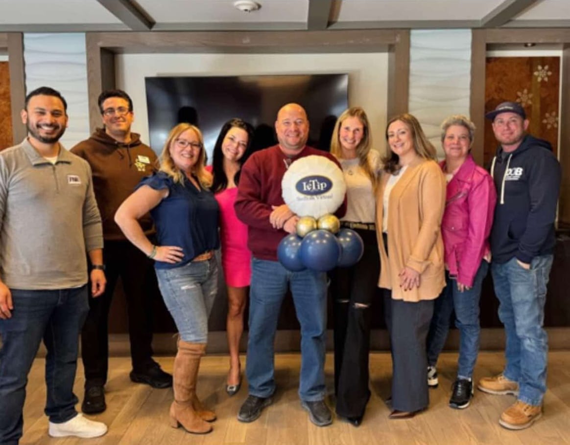 a group of people posing for a photo